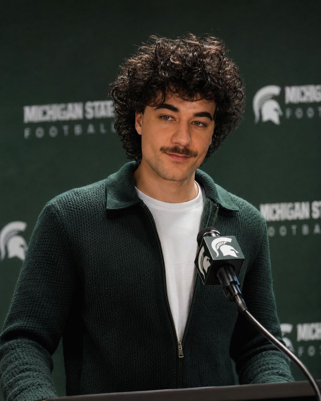 Nick Mansour at the postgame podium under Spartan Stadium